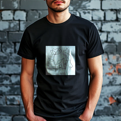 Čierne tričko Kiskedves Line Art s profilom a kvetom, na modelovi pred tehlovou stenou.